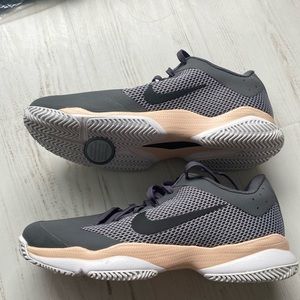 Nike gray and peach running shoes. Size 8